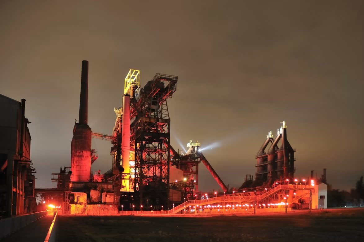 Steel plant lit up at night